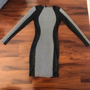 Knee length dress; very flattering.